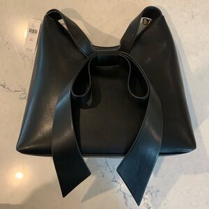 Anthropologie BRAND NEW black bow leather purse